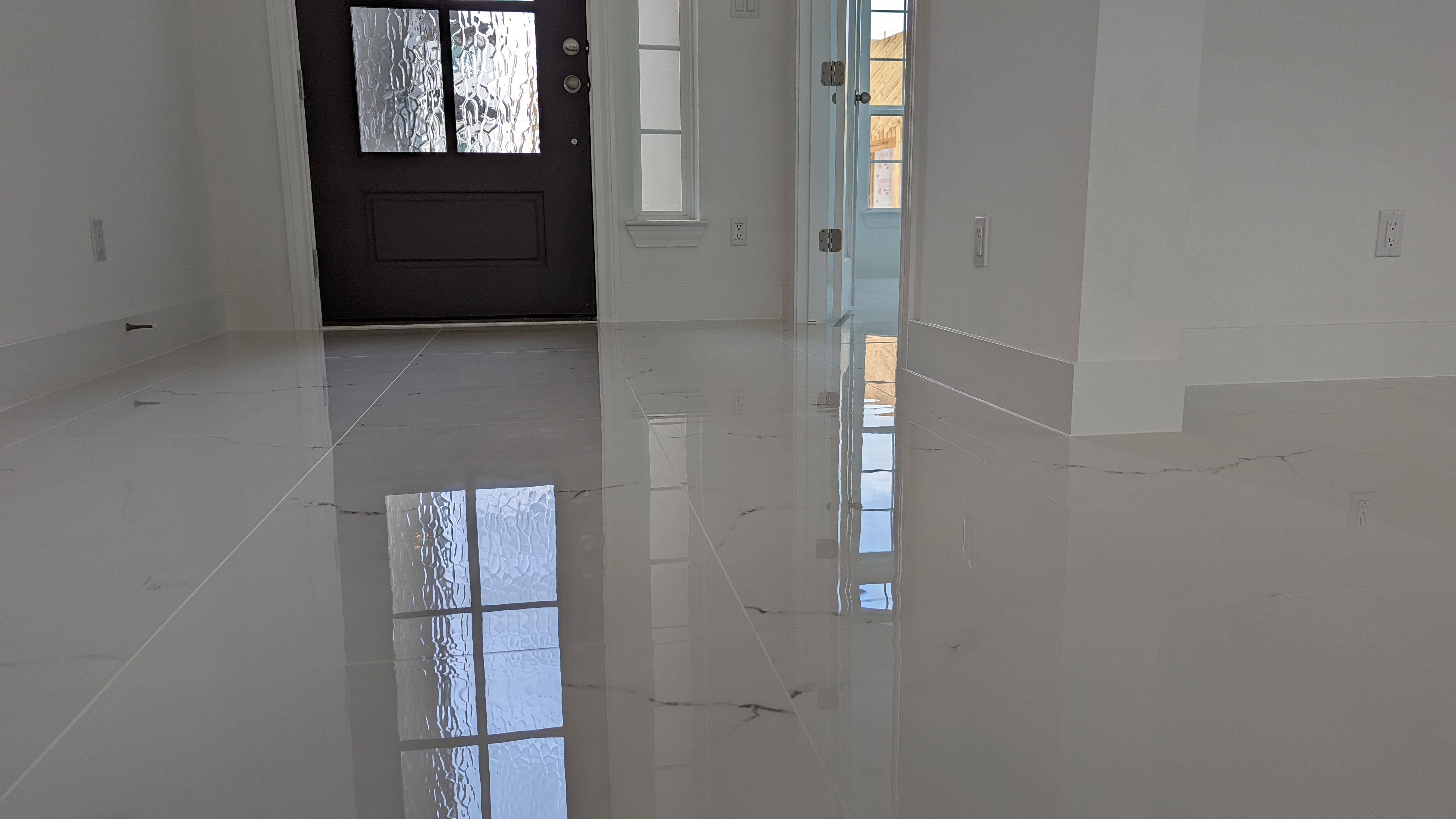 24x48 Iceland White Porcelain Tile In An Entryway